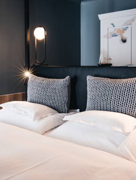 Doppelbett im Entners Hotel am See